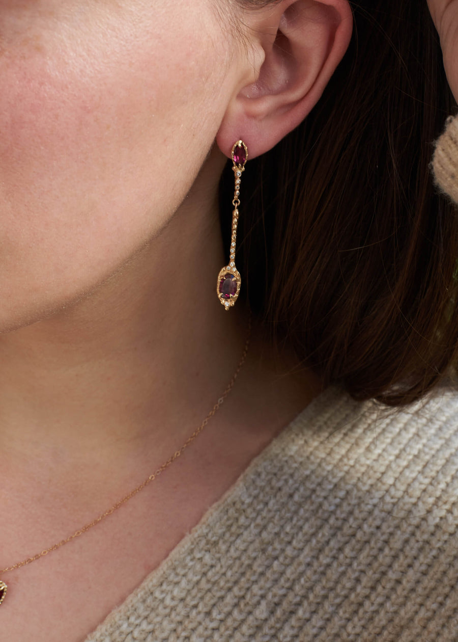 14k solid gold rhodolite garnet diamond Venus Drop Earrings on model