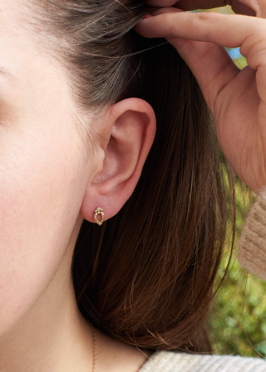 14k solid gold diamond Petal stud earrings on model, ready to ship