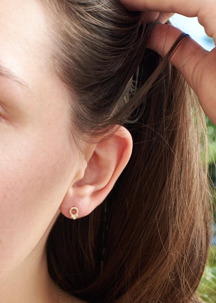 14k solid gold diamond Violetta stud earring on model, ready to ship