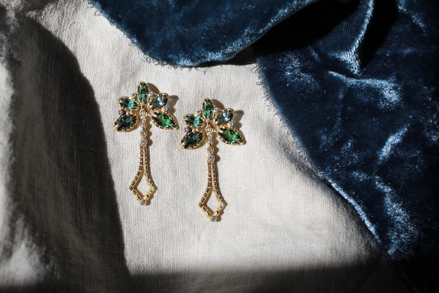 Solid 14k gold tourmaline diamond Amaryllis dangle earrings on velvet